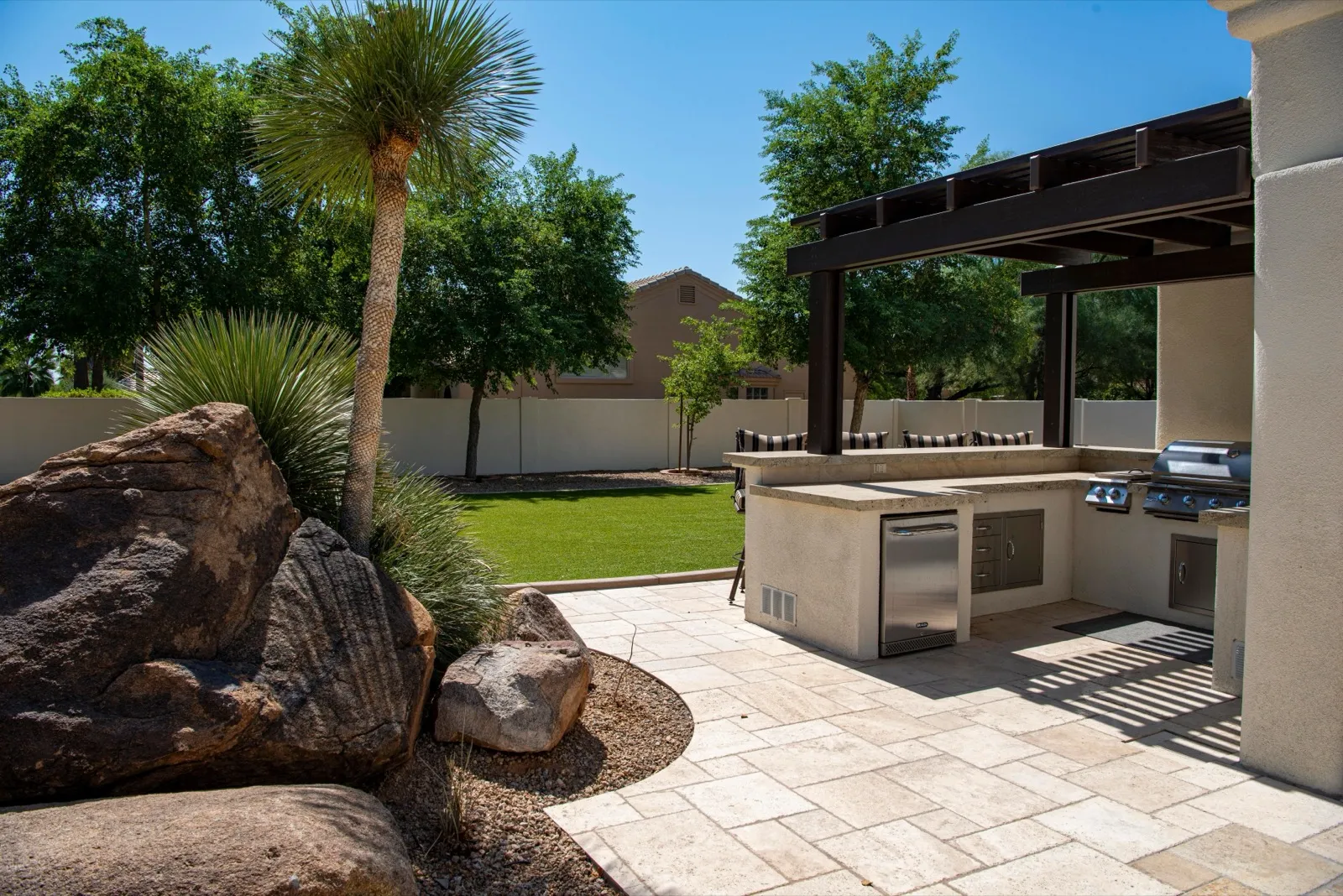 Outdoor kitchen and grill installation on a patio