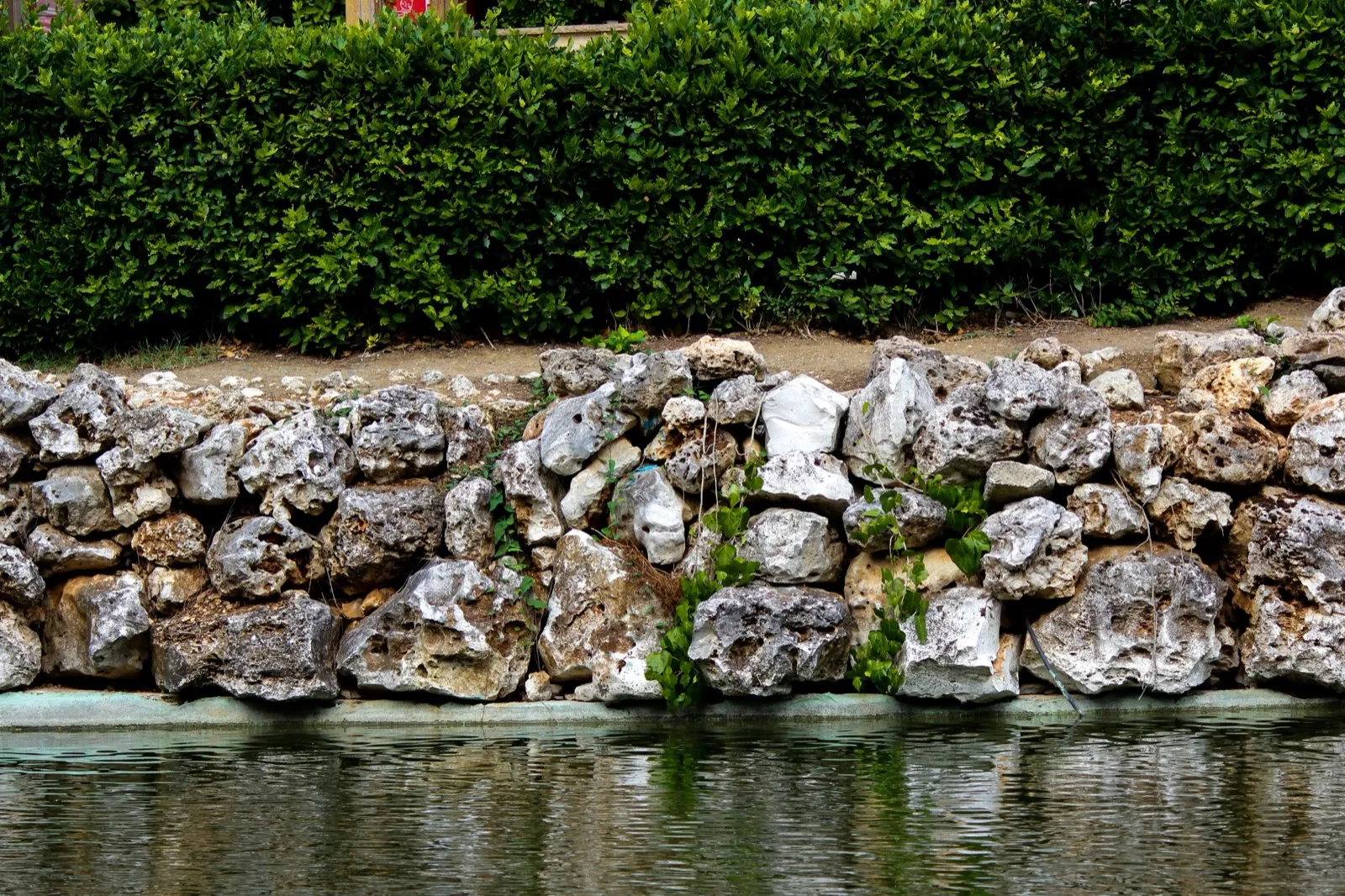 Natural stone retaining wall in a terraced landscape